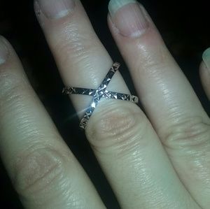 New Sterling silver criss cross diamond cut ring.